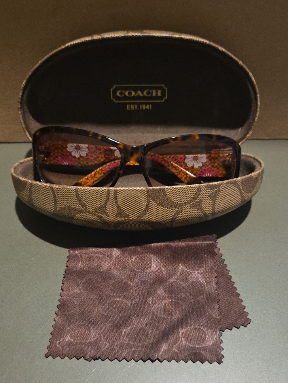 Coach Women's Tortoiseshell Sunglasses with Floral Temple Accents